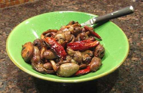 Chicken hearts and mushrooms